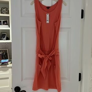 Women’s size small coral color cotton theory dress never worn. Tie waist
